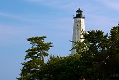 New London Harbor Lighthouse Tower Among Evergreens